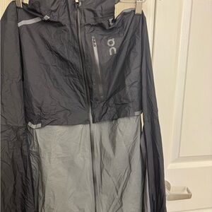 On Running Black and Gray weather jacket